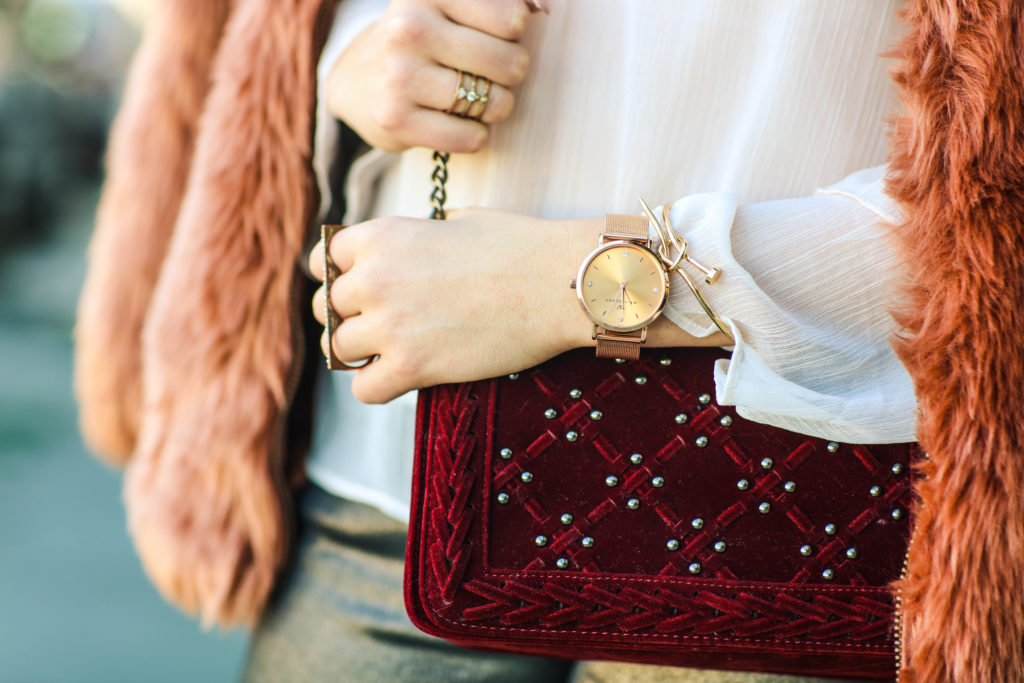 rose gold watch with velvet purse