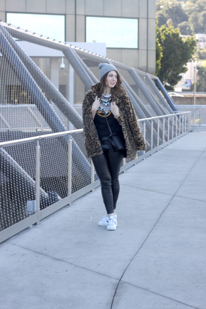 leather leggings and a leopard coat
